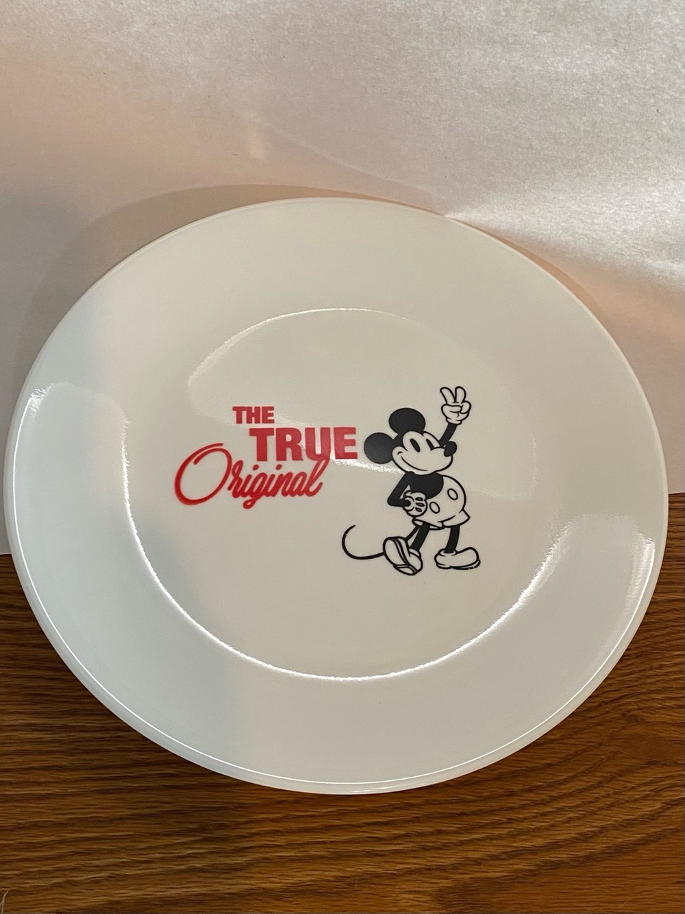Corelle Disney White Plate with Black Character Graphic and Red Text